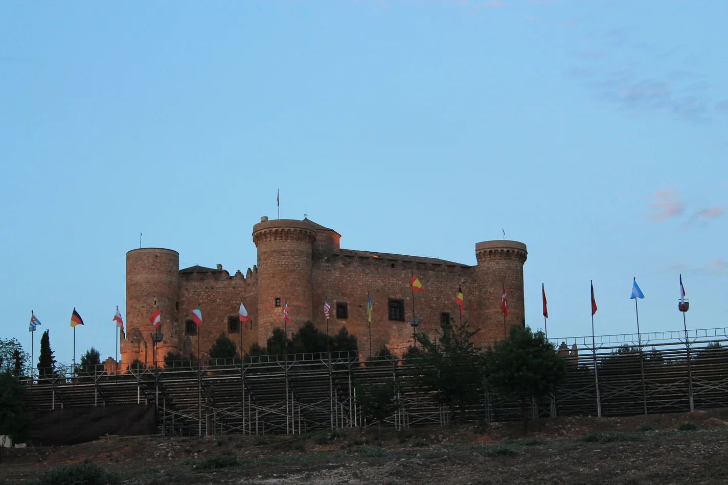 a castle with flags on the side